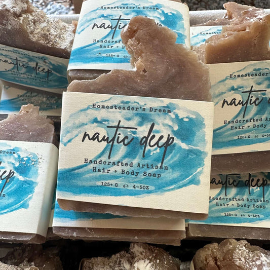 handcrafted artisan hair and body soap bars with Nautic Deep scent in basket