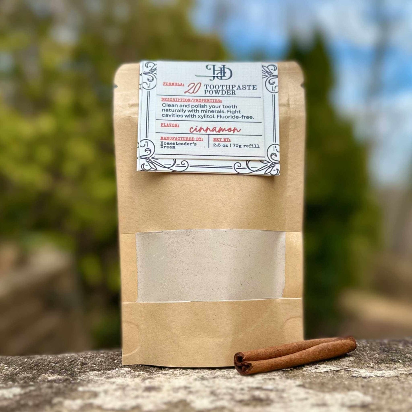 Kraft paper package with a label on a stone surface outdoors