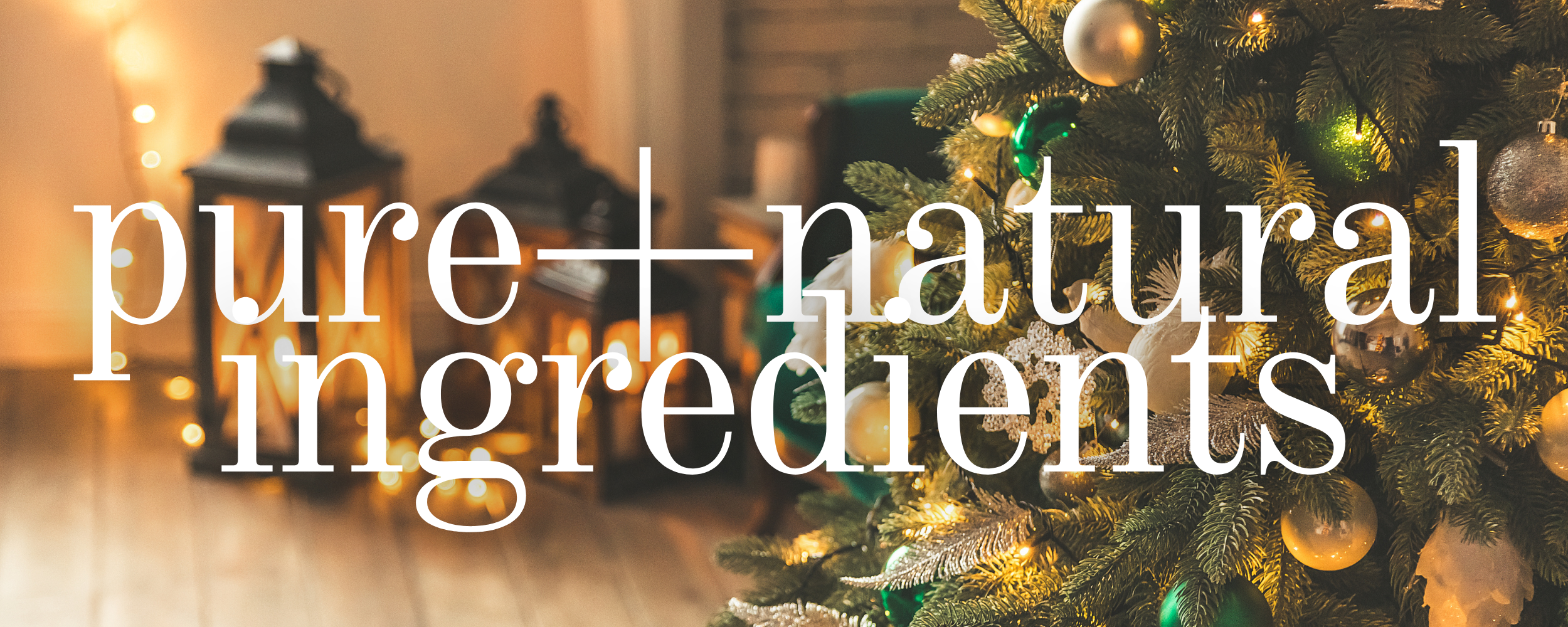 pure and natural ingredients text over christmas tree and lanterns