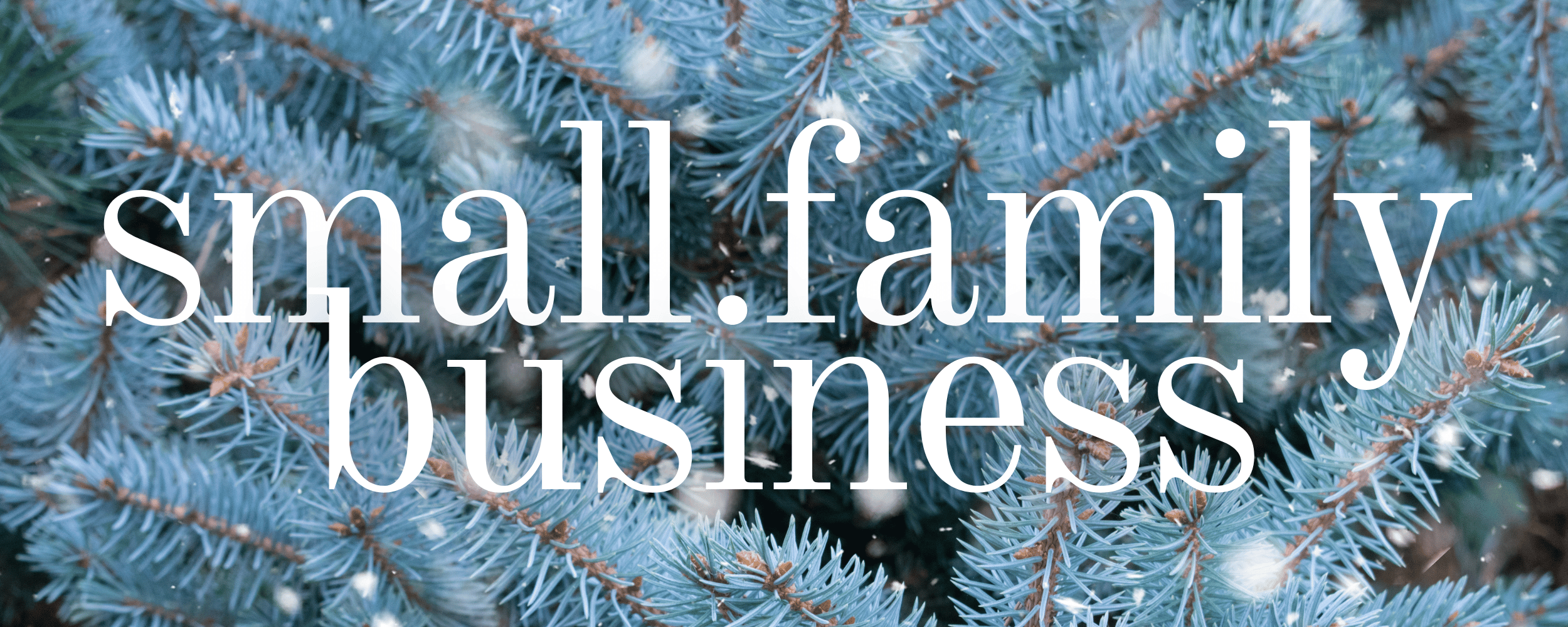 snowy spruce branches with text 'small family business'