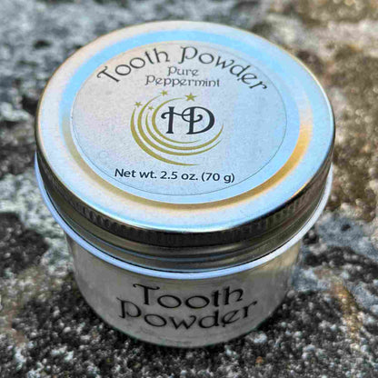 All Natural Mineral Large Pure Peppermint Tooth Powder Jar Top and Front on Stone Bench