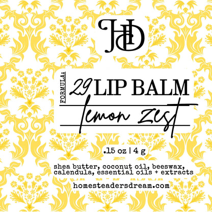 Lip balm packaging with lemon zest flavor on a decorative yellow and white background.