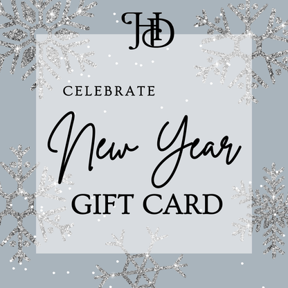 A glittery image featuring a 'Celebrate New Year' gift card from Homesteader's Dream, surrounded by snowflakes and stylish text.