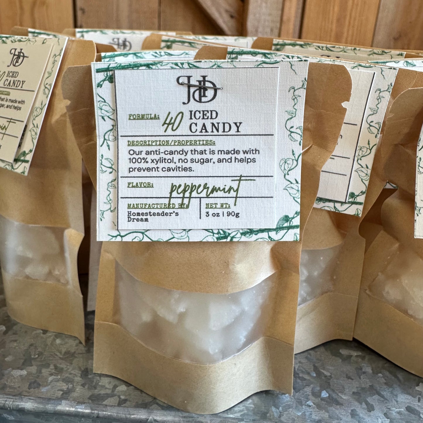 Packaged peppermint iced candy with a label on a metal tray