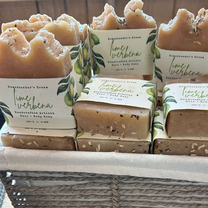 Handcrafted lime verbena soap bars in a woven basket.