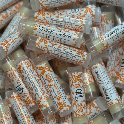 orange creme lip balm pile