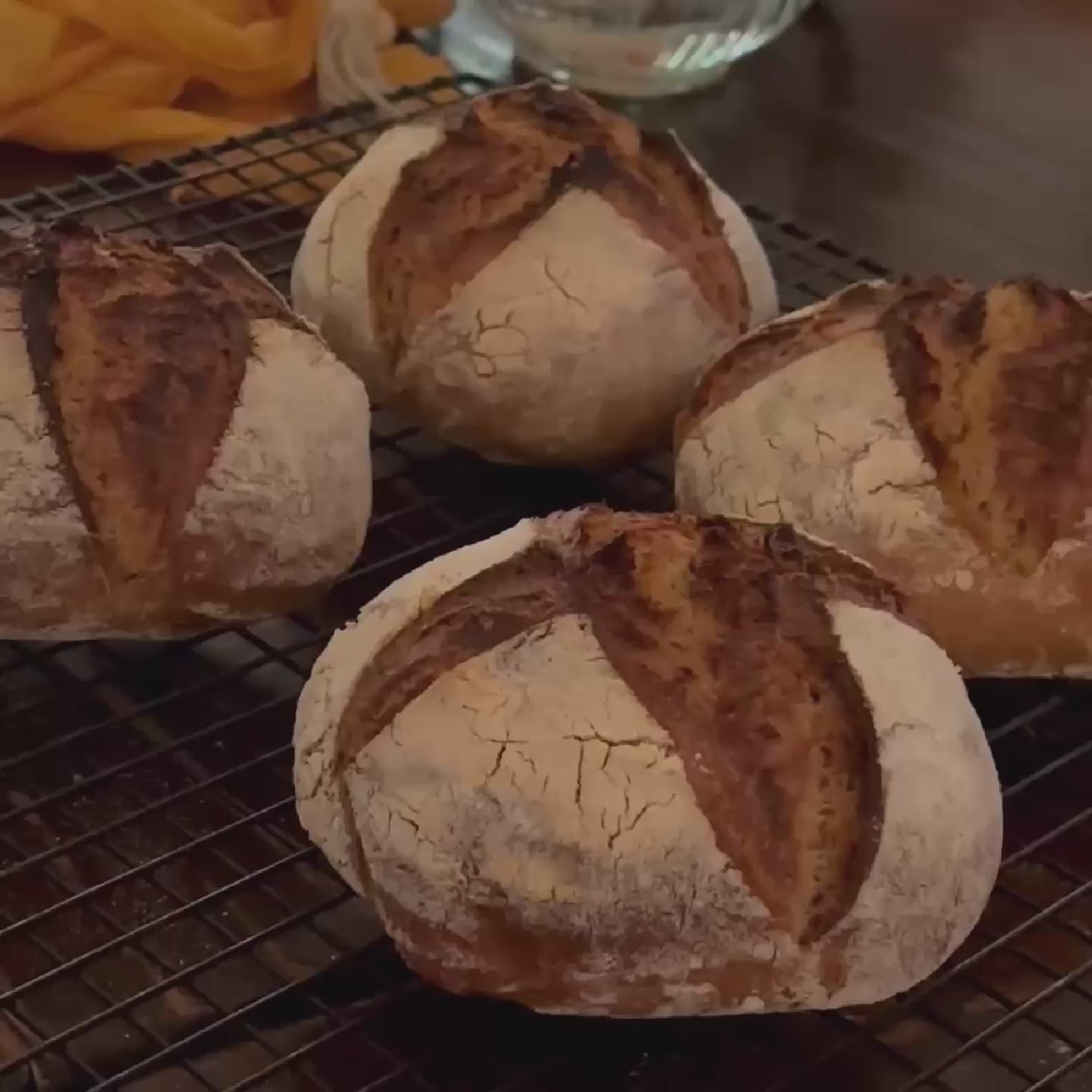 Video close-up of whole-grain sourdough mini loaves ￼