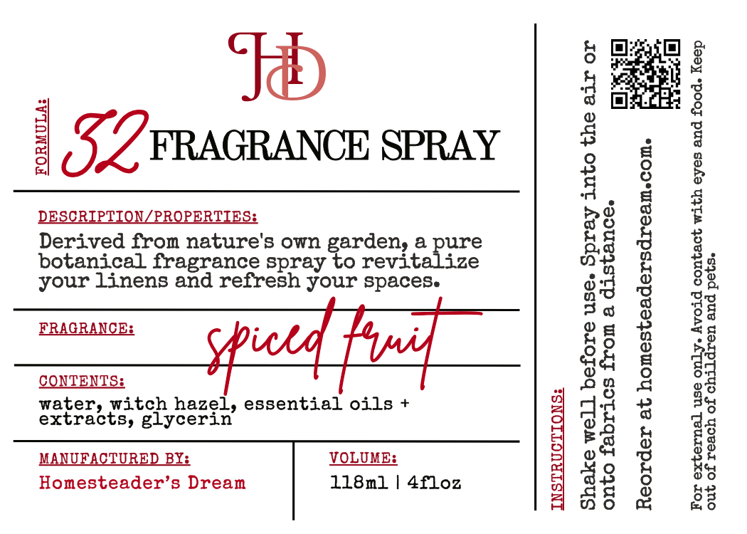Fragrance spray label with spiced fruit fragrance on a white background